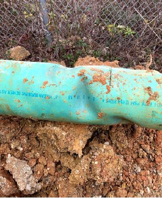 A photo of buckled PVC pipe taken from the ground by the city of Brandon.