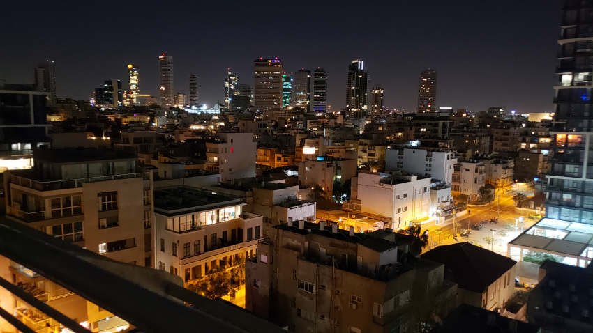 Night skyline of Tel Aviv from hotel window.