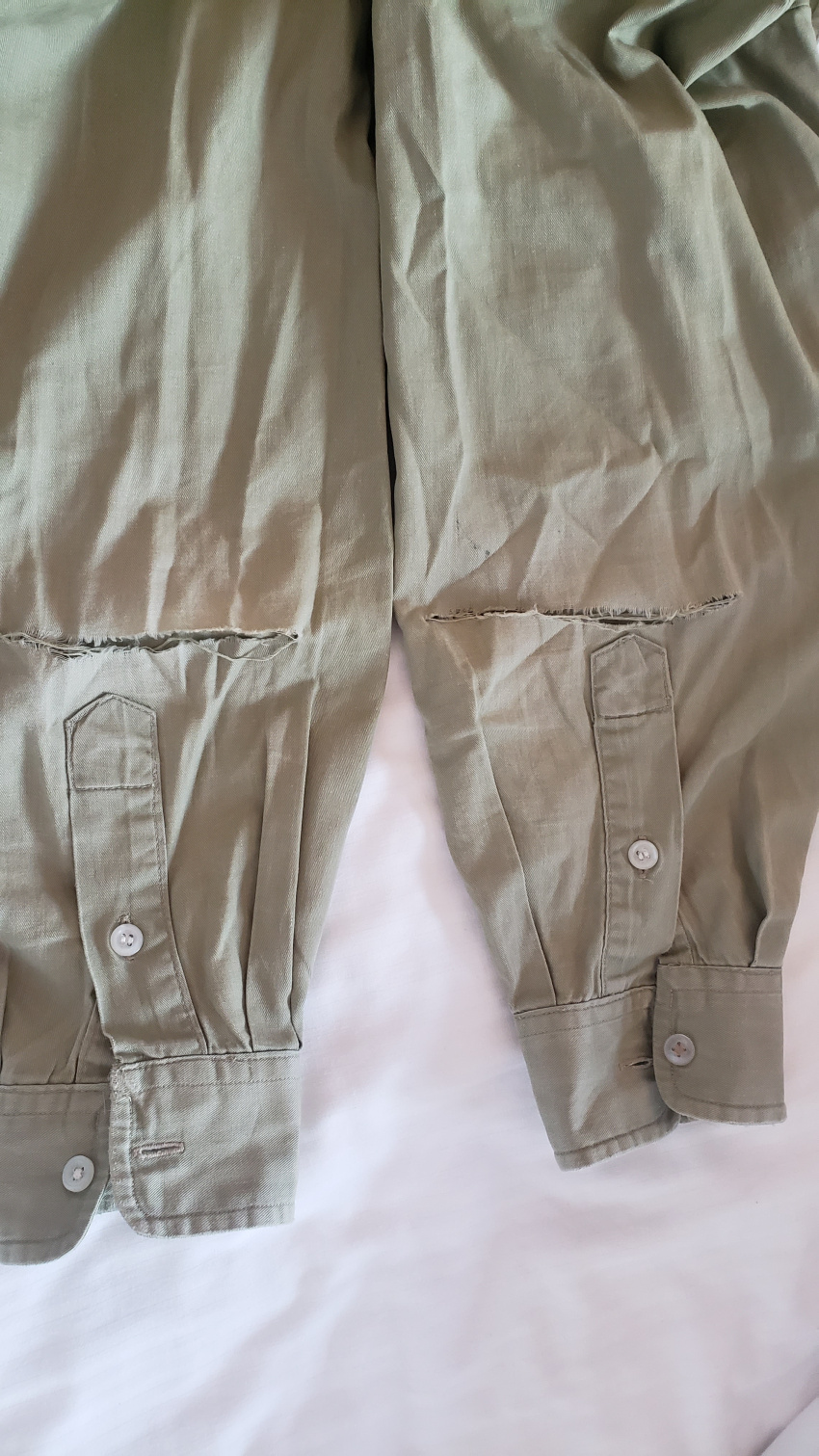 "torn in two from top to bottom"