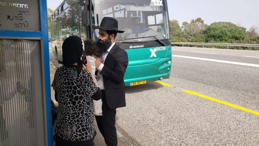 Some locals join us waiting for the bus.