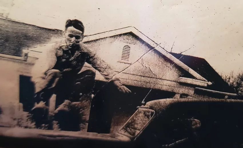 Bouncer jumping over a car to win a bet. He made a lot of money this way.