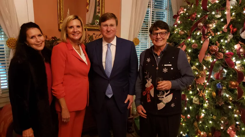 I wore my tacky Christmas vest.