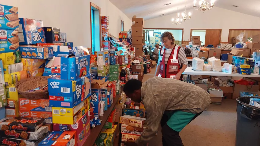 The First Baptist Church was packed with donated items. Red Cross had sign in procedures to prevent abuse. 