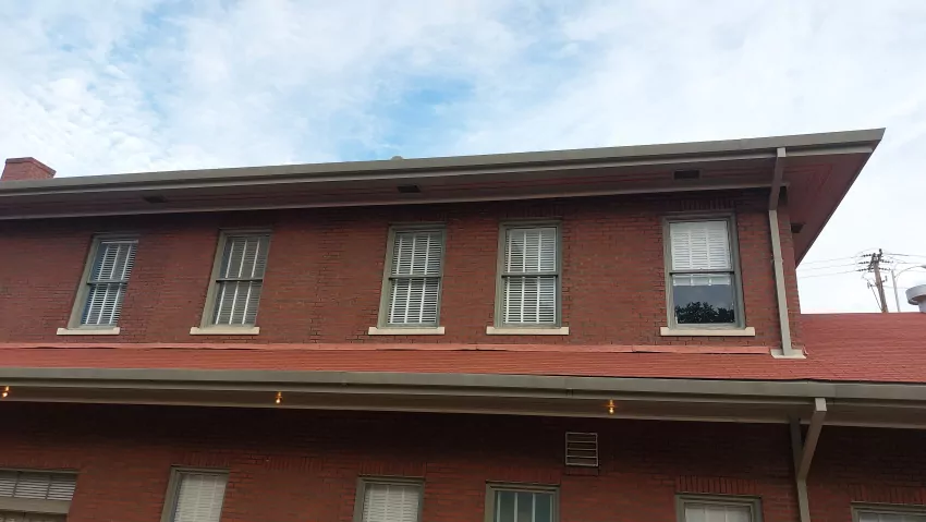 If you look carefully, you will see a frisbee stuck on the roof. It's been there for about 5 years. 