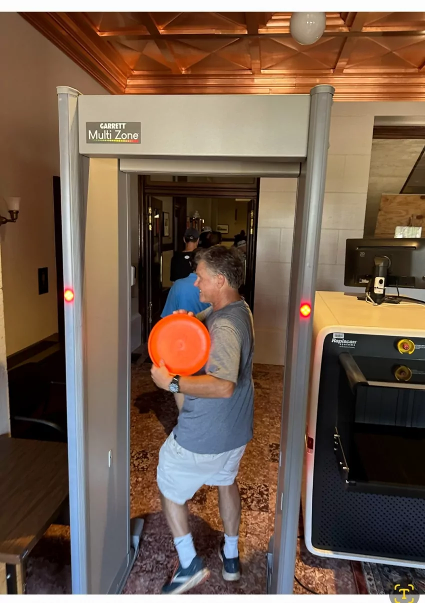 You never know how the authorities are going to react to a bunch of old guys playing frisbee golf downtown. In this case the officer in charge at the capitol building let us pass right on through to the other side. Nice guy! Not all the police were so nice.