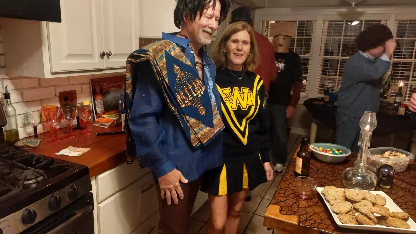 Tracy still fits into her high school cheerleading outfit. 