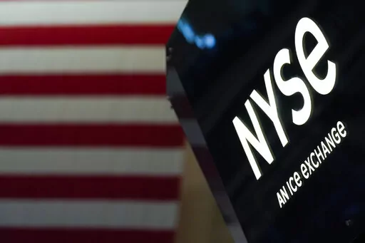 An NYSE sign is seen on the floor at the New York Stock Exchange in New York, on June 15, 2022.   Stocks are opening lower again on Wall Street, continuing a weak patch that has wiped out much of the gains the market made in July and early August. The S&P 500 lost about half a percent in the early going Thursday, Sept. 1. (AP Photo/Seth Wenig, File)