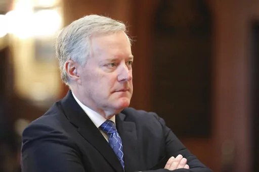 Former White House Chief of Staff Mark Meadows listens during an announcement of the creation of a new South Carolina Freedom Caucus based on a similar national group at a news conference on April 20, 2022 in Columbia, S.C. Meadows accused the congressional committee investigating last year's attack on the U.S. Capitol of leaking all of the text messages he provided to the panel in what he says was an effort to vilify him publicly. (AP Photo/Jeffrey Collins, File)