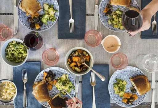 A table spread featuring turkey reuben sandwiches appear in New York on Oct. 17, 2017. (Katie Workman via AP)