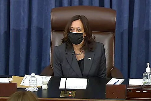 In this image from Senate TV, Vice President Kamala Harris sits in the chair on the Senate floor to cast the tie-breaking vote, her first, Feb. 5, 2021, at the Capitol in Washington. (Senate TV via AP, File)