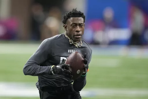 FILE -Mississippi State defensive back Emmanuel Forbes runs a drill at the NFL football scouting combine in Indianapolis, Friday, March 3, 2023. The Washington Commanders have selected Mississippi State cornerback Emmanuel Forbes with the 16th pick in the NFL draft, Thursday, April 27, 2023. (AP Photo/Darron Cummings, File)
