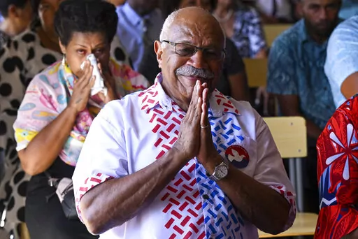 People's Alliance Party leader Sitiveni Rabuka gestures during a church service at the Fijian Teachers Association Hall in Suva, Fiji, Sunday, Dec. 18, 2022. Fijian police on Thursday, Dec. 22, 2022 said they were calling in the military to help maintain security following a close election last week that is now being disputed.(Mick Tsikas/AAP Image via AP)