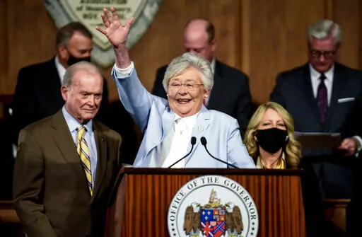 Alabama Gov. Kay Ivey waves as she arrives to deliver her State of the State address at the State Capitol Building in Montgomery, Ala., Jan. 11, 2022. Ninth grader Harleigh Walker, 15, spent her spring break trying unsuccessfully to persuade members of the state House and Senate to reject legislation banning gender-affirming medications for transgender kids like her under 19. On Thursday, April 7, Alabama lawmakers passed the measure, and Gov. Ivey signed it into law on Friday. (Mickey Welsh/The