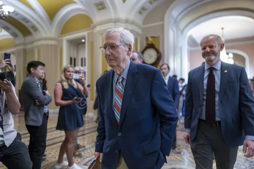 Senate Minority Leader Mitch McConnell, R-Ky., enters the chamber as he returns to work at the Capitol in Washington, Tuesday, Sept. 5, 2023. Questions have mounted over the long-serving Republican leader's health since McConnell froze up last week during a press conference in Kentucky, unable to respond to a question. It was the second such episode in a matter of weeks. (AP Photo/J. Scott Applewhite)