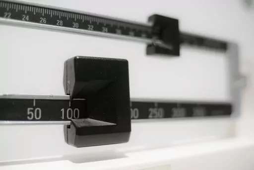 This Tuesday, April 3, 2018 file photo shows a closeup of a beam scale in New York. The Food and Drug Administration is warning consumers, Thursday, June 1, 2023, not to use off-brand versions of the popular weight-loss drugs Ozempic and Wegovy sold online because they might not contain the same ingredients as the prescription products and may not be safe or effective. (AP Photo/Patrick Sison, File)