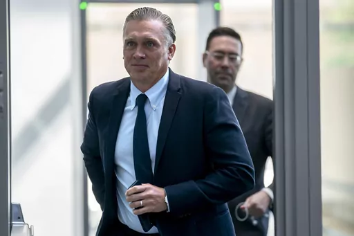 Devon Archer, Hunter Biden's former business partner, passes through the security checkpoint as he arrives on Capitol Hill to give closed-door testimony to the House Oversight Committee in the Republican-led investigations into President Biden's son, in Washington, Monday, July 31, 2023. House Republicans released a transcript Thursday, Aug. 3, of their interview with Hunter Biden’s former business associate detailing overseas financial dealings with the president’s son. (AP Photo/J. Scott A