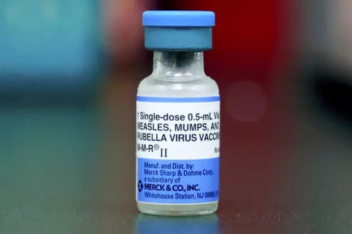 This Friday, May 17, 2019 file photo shows a vial of a measles, mumps and rubella vaccine in Mount Vernon, Ohio. According to a report released by the Centers for Disease Control and Prevention on Thursday, April 21, 2022, a smaller portion of U.S. children got routine vaccinations required for kindergarten during the pandemic, raising concerns that measles and other preventable diseases could increase. (AP Photo/Paul Vernon, File)