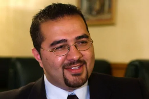Mohamed Khairullah, a Borough Council member in Prospect Park, N.J., who was appointed mayor, pauses during an interview in Paterson, N.J., July 30, 2004. The New Jersey mayor who was blocked from attending a White House celebration this week with President Joe Biden to belatedly mark the end of the Muslim holy month of Ramadan called Tuesday, May 1, 2023, for the administration to end the federal “watch list” that he said illegally targets Muslims and others. (AP Photo/Mike Derer, File)