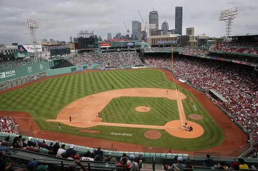 The Baltimore Orioles play against the Boston Red Sox during the eighth inning of the first baseball game of a doubleheader May 28, 2022, in Boston. Pickleball courts were being laid out in Fenway Park on Tuesday, July 11, 2023, in preparation for a weekend that will give fans of the sport a chance to watch the pros play or even give it a try themselves in the outfield of the Red Sox's historic home. (AP Photo/Michael Dwyer, File)