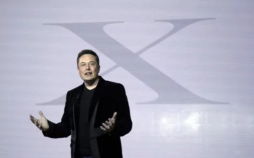 Elon Musk, CEO of Tesla Motors Inc., introduces the Model X car at the company's headquarters Tuesday, Sept. 29, 2015, in Fremont, Calif. Musk may want to send “tweet” back to the birds, but the ubiquitous term for posting on the site he now calls X is here to stay, at least for now. For one, the word is still plastered all over the website formerly known as Twitter. Write a post, you still need to press a blue button that says “tweet” to publish it. To repost it, you still tap “retwee