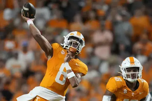 Tennessee quarterback Nico Iamaleava (8) throws a pass during the first half of an NCAA college football game against Kent State, Saturday, Sept. 14, 2024, in Knoxville, Tenn. (AP Photo/George Walker IV)