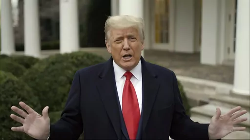 This exhibit from video released by the House Select Committee, shows President Donald Trump recording a video statement on the afternoon of Jan. 6, 2021, from the Rose Garden at the White House in Washington. Trump's lawyers have suggested their strategy in his election interference case in Washington involves distancing their client from the horde of U.S. Capitol rioters, whom the former president has embraced on the campaign trail.(House Select Committee via AP)
