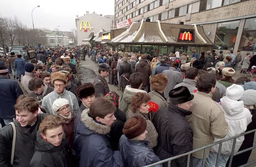 Hundreds of Muscovites line up outside the first McDonald's restaurant in the Soviet Union on its opening day, in Moscow, Wednesday, Jan. 31, 1990. Two months after the Berlin Wall fell, another powerful symbol opened its doors in the middle of Moscow: a gleaming new McDonald’s. It was the first American fast-food restaurant to enter the Soviet Union. But now, McDonald's is temporarily closing its 850 restaurants in Russia in response to the Ukraine invasion. (AP Photo, File)