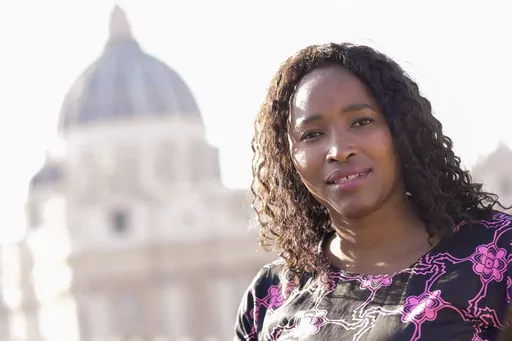 Southern African Catholic Bishops' Conference Communication Officer Sheila Pires poses for a portrait at The Vatican, Friday, Sept. 29, 2023. Pires has been invited to take part in the next synod of bishops starting Oct. 4. “I think the church has just come to a point of realization that the church belongs to all of us, to all the baptized,” she says. Of the 365 voting members, only 54 are women and organizers insist the aim is to reach a consensus, not tally votes like a parliament. But the