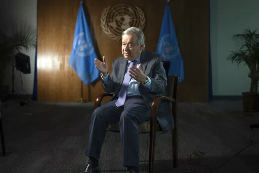 United Nations Secretary-General Antonio Guterres speaks during interview at the UN Headquarters, Thursday, Jan. 20, 2022, in New York. As he starts his second term as U.N. secretary-general, Antonio Guterres said Thursday the world is worse in many ways than it was five years ago because of the COVID-19 pandemic, the climate crisis and geopolitical tensions that have sparked conflicts everywhere -- but unlike U.S. President Joe Biden he thinks Russia will not invade Ukraine.(AP Photo/Robert Bum