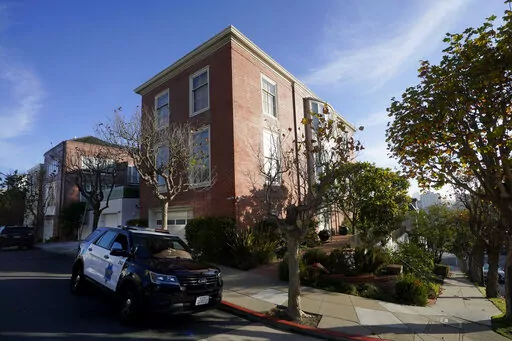 A San Francisco Police Department vehicle parks outside the home of Speaker of the House Nancy Pelosi, in San Francisco, Saturday, Oct. 29, 2022.  On Friday, Nov. 4, The Associated Press reported on stories circulating online incorrectly claiming the attack on Paul Pelosi was a “Domestic Violence Case in a consensual sexual relationship." (AP Photo/Jeff Chiu, File)