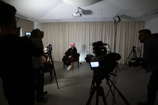 Oleh Psiuk, frontman of Ukraine's Kalush Orchestra talks during an interview in Turin, Italy, Thursday May 5, 2022. Ukrainian band Kalush Orchestra’s upbeat, melodic entry to this month’s Eurovision Song Contest was written as a tribute to the frontman’s mother. But since the Russian invasion of Ukraine, the song called “Stefania” has become an anthem to the country's war-ravaged motherland.  (AP Photo/Antonio Calanni)