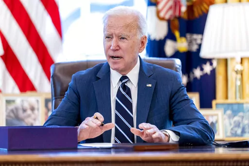 President Joe Biden speaks before signing the American Rescue Plan, a coronavirus relief package, in the Oval Office of the White House, March 11, 2021, in Washington.It's been one year since President Joe Biden signed into law the American Rescue Plan. The $1.9 trillion package of relief measures was designed to fight the coronavirus pandemic and help the economy rebound. (AP Photo/Andrew Harnik, File)