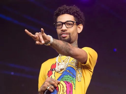 Philadelphia rapper PnB Rock performs at the 2018 Firefly Music Festival in Dover, Del., on June 16, 2018. The rapper, whose real name is Rakim Allen, was fatally shot during a robbery in South Los Angeles on Monday, Sept. 12, 2022. He is best known for his 2016 hit “Selfish.” He released his latest song, “Luv Me Again,” on Sept. 2. (Photo by Owen Sweeney/Invision/AP, File)
