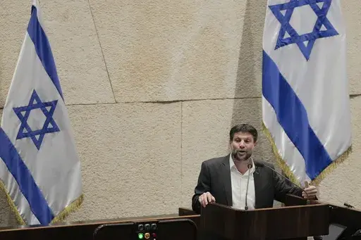 Bezalel Smotrich, Israeli Minister of Finance, addresses the parliament in Jerusalem, March 27, 2023. Israel's finance minister has slammed a decision by the financial ratings agency Moody’s to downgrade Israel’s credit rating. Bezalel Smotrich says the decision “did not include serious economic claims.” In its announcement Friday, Feb. 9, 2024, Moody's warned that the ongoing war in Gaza and a possible war in the north with Hezbollah could adversely affect Israel’s economy. (AP Photo/