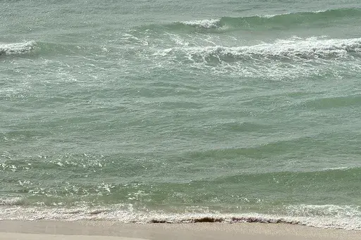Waves approach the shore in Panama City Beach, Fla., on Tuesday, Jan. 10, 2017. On Saturday, June 22, 2024, authorities said three Alabama men have died from likely drowning after becoming distressed while swimming at a Florida Panhandle beach. (Andrew Wardlow/News Herald via AP, File)