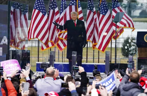 In this Jan. 6, 2021, photo, President Donald Trump arrives to speak at a rally in Washington. A federal judge on Feb. 18, 2022, rejected efforts by the former president to toss out lawsuits filed by lawmakers and two Capitol police officers, saying in his ruling that the former president's words "plausibly" may have led to the Jan. 6, 2021 insurrection. (AP Photo/Jacquelyn Martin, File)