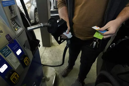 A customer prepares to pump gasoline into his car at a Sam's Club fuel island in Gulfport, Miss., Feb. 19, 2022. For the 12 months ending in March, consumer prices surged 8.5% — posting the fastest year-over-year pace since December 1981 and topping February's previous 40-year high of 7.9%, the Labor Department said Tuesday, April 12. Even if you toss out volatile food and energy prices, so-called core inflation jumped 6.5% in March from a year earlier. That was also the sharpest such jump in 