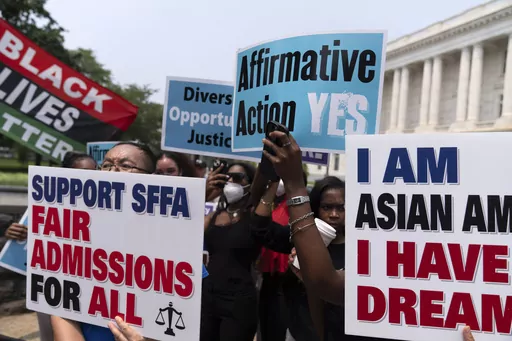 Demonstrators protest outside of the Supreme Court in Washington, Thursday, June 29, 2023, after the Supreme Court struck down affirmative action in college admissions, saying race cannot be a factor. Days after the Supreme Court outlawed affirmative action in college admissions, activists say they will sue Harvard over its use of legacy preferences for children of alumni. (AP Photo/Jose Luis Magana, File)