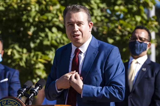 Pedro Martinez speaks shortly after Mayor Lori Lightfoot announced him as the new chief executive of the Chicago Public Schools during a news conference in Chicago on Sept. 15, 2021. Martinez says classes will be canceled Wednesday, Jan. 5, 2022, if the teachers union votes to switch to remote learning due to record COVID-19 levels. (Ashlee Rezin/Chicago Sun-Times via AP, File)