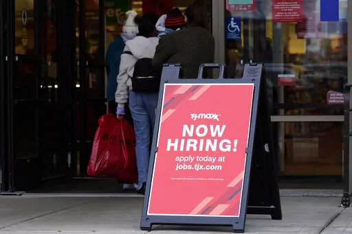 Hiring sign is displayed outside of a retail store in Vernon Hills, Ill., Saturday, Nov. 13, 2021. Labor Department releases weekly report on unemployment benefits on Thursday, Dec. 1, 2022. On Thursday the Labor Department reports on the number of people who applied for unemployment benefits last week. (AP Photo/Nam Y. Huh, File)