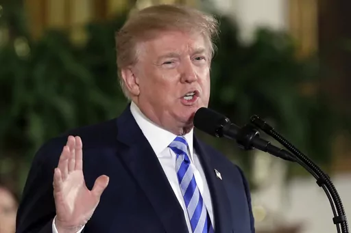 President Donald Trump speaks in the East Room of the White House in Washington on Feb. 20, 2018. Trump's White House has failed to report more than 100 gifts from foreign nations worth more than a quarter-million dollars, and federal officials have been unable to find a life-size painting of Trump given by the president of El Salvador as well as golf clubs from the prime minister of Japan, according to a report Friday from House Democrats. (AP Photo/Evan Vucci, File)