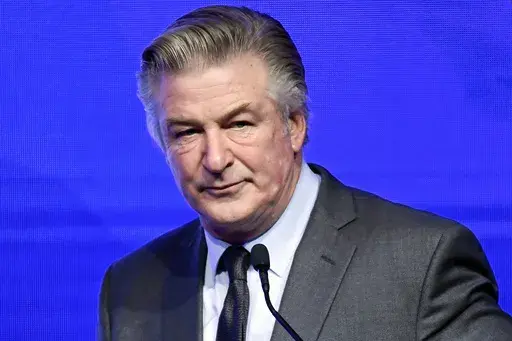 Alec Baldwin emcees the Robert F. Kennedy Human Rights Ripple of Hope Award Gala at New York Hilton Midtown on Dec. 9, 2021, in New York. A New Mexico judge is scheduled to consider at a Friday, June 21, 2024, hearing, whether to compel a movie set armorer to testify at actor Baldwin's involuntary manslaughter trial for the fatal shooting of a cinematographer during rehearsal for the Western movie “Rust.” (Photo by Evan Agostini/Invision/AP, File)