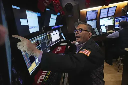 Trader Jonathan Mueller works on the floor of the New York Stock Exchange, Tuesday, Feb. 4, 2025. (AP Photo/Richard Drew, file)