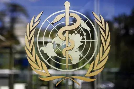 The logo of the World Health Organization is seen at the WHO headquarters in Geneva, Switzerland, June 11, 2009. The World Health Organization chief on Tuesday, Feb. 1, 2022 says 90 million cases of coronavirus have been reported since the omicron variant was first identified 10 weeks ago, amounting to more than in all of 2020, the first year of the COVID-19 pandemic. (AP Photo/Anja Niedringhaus, File)