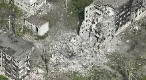 This photo taken from a drone video provided by Ukraine Patrol Police, shows devastation in Chasiv Yar, an eastern Ukrainian city Russia is assaulting, Ukraine, Monday, April 29, 2024. The footage shows the community of Chasiv Yar - which is set amid green fields and woodland - reduced to a skeletal ghost town with few residents left. The apocalyptic scene is reminiscent of the cities of Bakhmut and Avdiivka, which Ukraine yielded after months of bombardment and huge losses for the Kremlin’s f