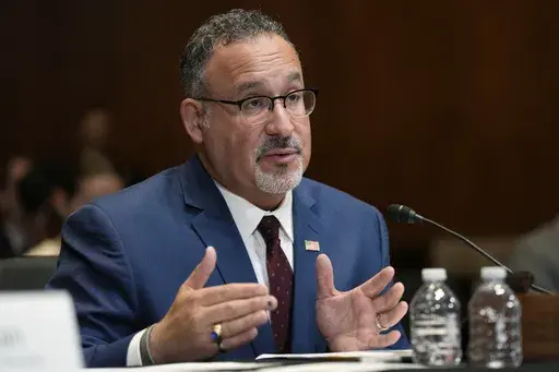 Education Secretary Miguel Cardona testifies during a Senate Appropriations Subcommittee on Labor, Health and Human Services, and Education, and Related Agencies hearing on Capitol Hill in Washington, April 30, 2024. The Biden administration is cancelling student loans for another 160,000 borrowers through a combination of existing programs. (AP Photo/Susan Walsh)