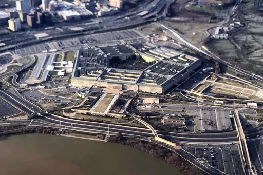 The Pentagon is seen in this aerial view made through an airplane window in Washington, Jan. 26, 2020. Reports of sexual assaults across the U.S. military jumped by 13% last year, driven by significant increases in the Army and the Navy as bases began to move out of pandemic restrictions and public venues opened back up. (AP Photo/Pablo Martinez Monsivais, File)