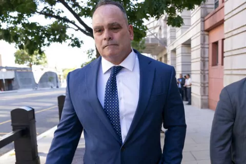 Retired New York Police Department officer Thomas Webster leaves the federal courthouse in Washington, Thursday, Sept. 1, 2022. Webster was sentenced on Thursday to 10 years in prison for attacking the U.S. Capitol and using a metal flagpole to assault one of the police officers trying to hold off a mob of Donald Trump supporters. (AP Photo/Jose Luis Magana)