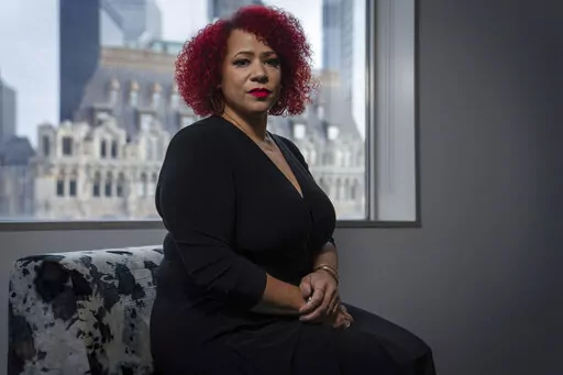 Journalist Nikole Hannah-Jones poses for a portrait at the headquarters of The Associated Press in New York, Friday, Dec. 10, 2021. (AP Photo/Robert Bumsted)