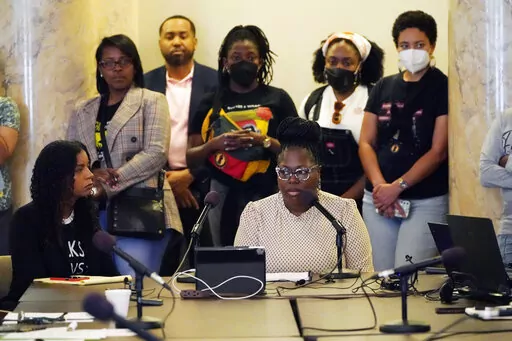 Arkela Lewis, bottom right, mother of Jaylen Lewis, who was shot to death during an encounter with officers of the Mississippi Capitol Police department, testifies before members of the Jackson delegation of the Mississippi Legislature at the Mississippi Capitol in Jackson, Monday, March 6, 2023. Lewis was one of several witnesses who spoke against a bill that would increase state involvement in the Hinds County court system and expand the jurisdiction of Capitol Police inside the city of Jackso